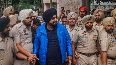 Patiala: Congress leader Navjot Singh Sidhu comes out of the Central Jail after spending nearly 10 months in Patiala central jail in a 1988 road rage death case, in Patiala, Saturday, April 1, 2023. (PTI Photo) (PTI04_01_2023_000189B)